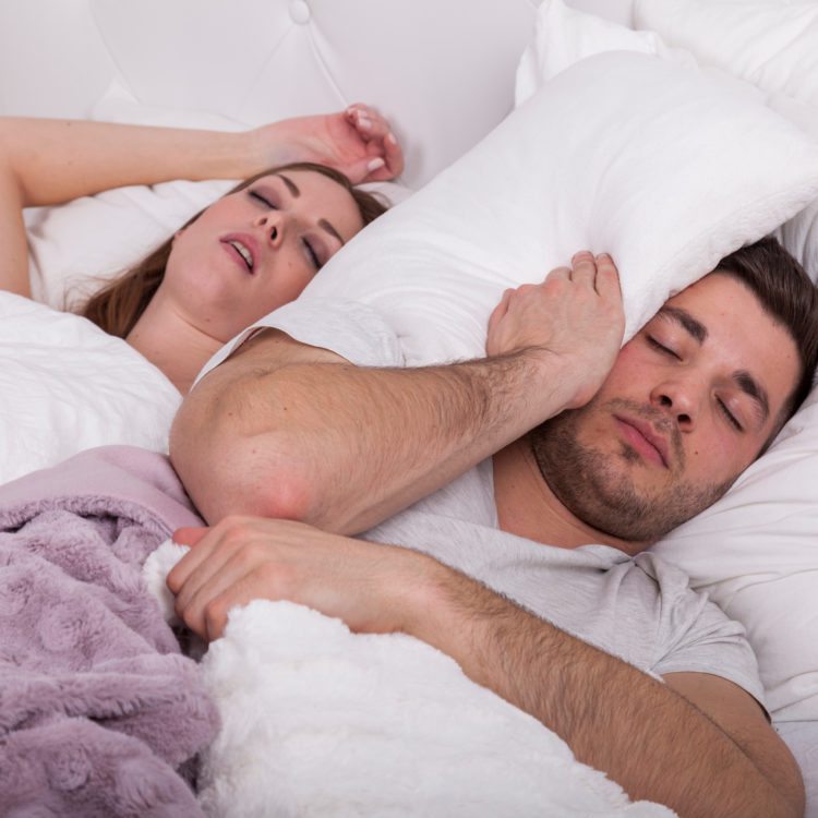 man and woman sleeping